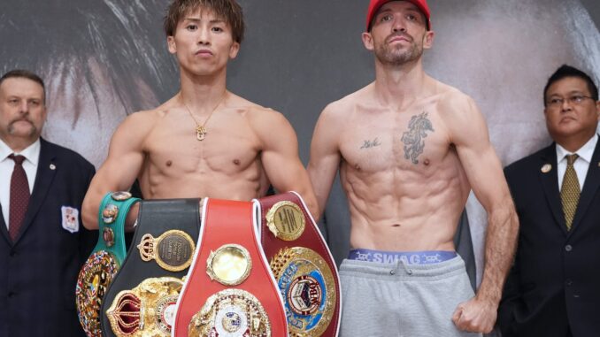 Naoya Inoue posa en el pesaje con sus cinturones previo al combate con TJ Doheny